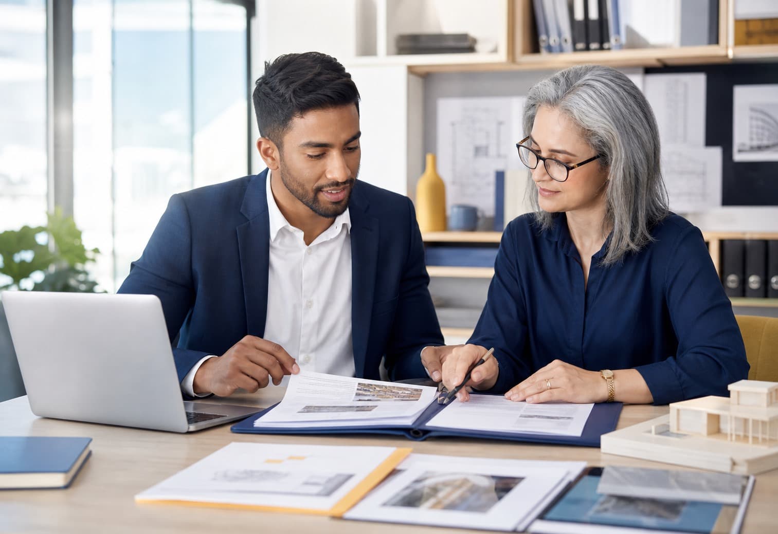 Registration advisor reviewing professional evidence with a candidate
